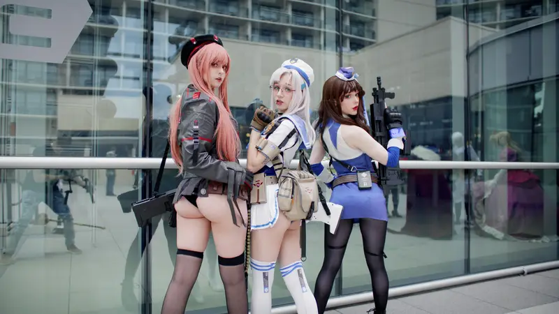 Cosplayers posing near the defunct Hycube hydroponic garden.