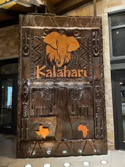 A giant wooden door greets you at the entrance.